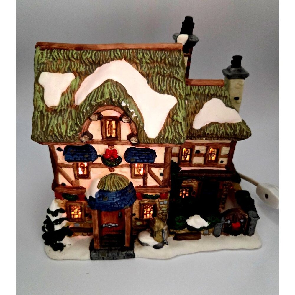 Santa's Workbench "Woodview Cottage" from the Towne Series, a collectible illumi